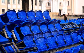 blue easy chairs on stadium