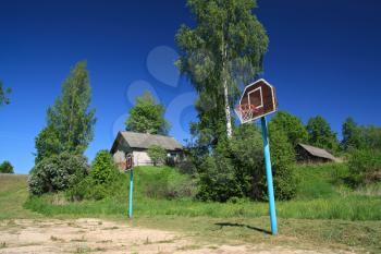 basketball ring on rural atheletic stadium