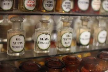 Shelves with medicines in the old pharmacy. Soft focus,