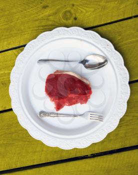 Royalty Free Photo of a Piece of Meat on a Plate