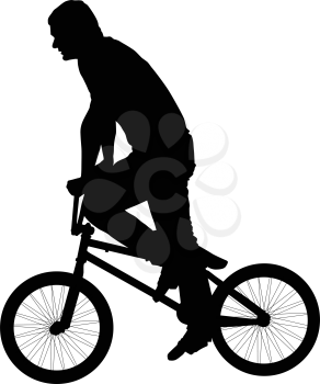 Black silhouette of a young man on a bike