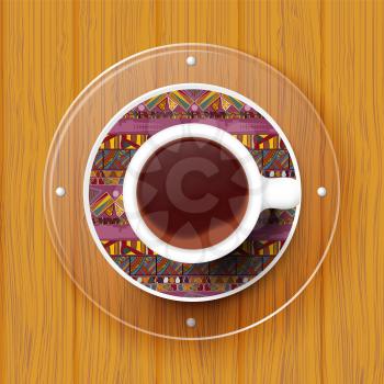 Cup of coffee on a saucer with Tribal texture. Vector illustration