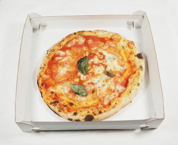 Margherita aka margarita traditional Italian pizza in a carton box