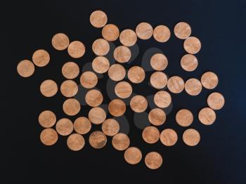 One Cent Dollar coins money (USD), currency of United States over black background