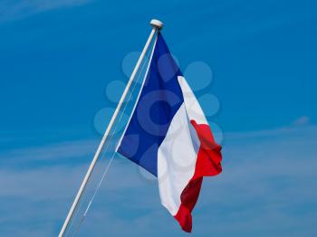 the French national flag of France, Europe over blue sky
