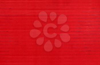 red corrugated cardboard texture useful as a background