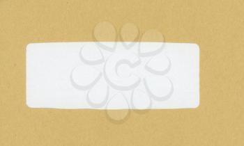brown paper letter envelope with blank white label for mail postage