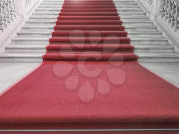 Red carpet on a stairway used to mark the route taken by heads of state, vips and celebrities on ceremonial and formal occasions or events