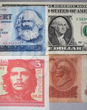 Portraits of Marx, Washington, Che Guevara and Lenin on DDR, USA, Cuba and CCCP banknotes