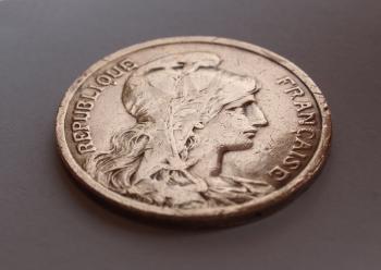 Vintage France coin with the French republic represented as a beautiful woman