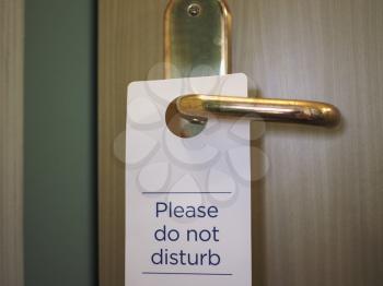 please do not disturb sign on hotel room door