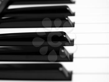 Detail of black and white keys on music keyboard - selective focus