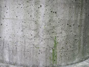 weathered grey concrete with moss texture useful as a background