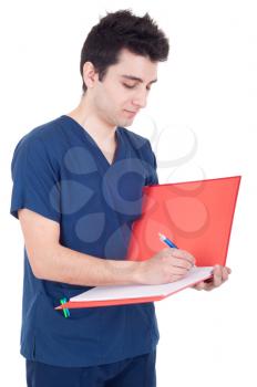 Royalty Free Photo of a Doctor Writing Notes