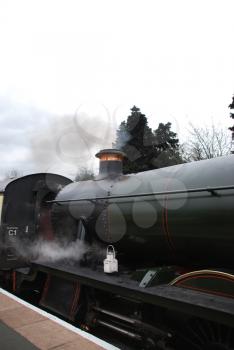 Royalty Free Photo of an Old Antique Steam Train on the Railway