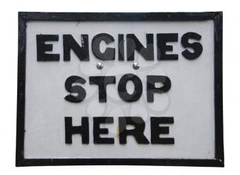Royalty Free Photo of an Antique Engines Stop Here Sign 