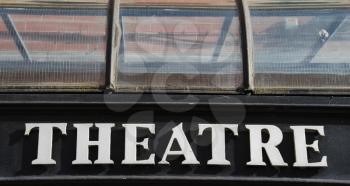 Royalty Free Photo of a White Vintage Theatre Sign