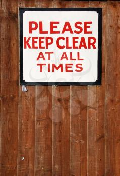 Royalty Free Photo of a Please Keep Clear at All Times Vintage Sign