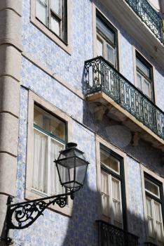 Royalty Free Photo of an Antique Building and Lamp in Lisbon, Portugal