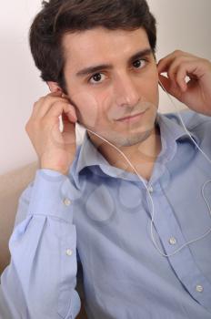 Royalty Free Photo of Man Listening to Music