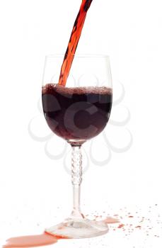 Royalty Free Photo of Red Wine Being Poured into a Glass