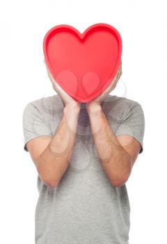Royalty Free Photo of a Man Holding a Heart