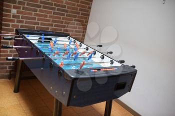 Foosball table in a school building for students