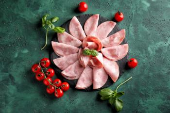 Composition with delicious sliced ham on table, top view�
