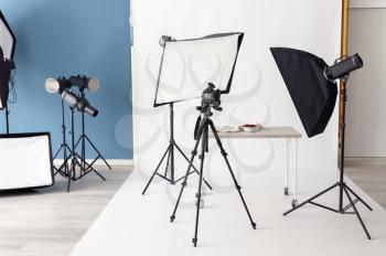 Interior of modern photo studio with professional equipment�
