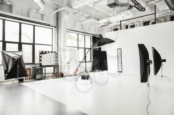 Interior of modern photo studio with professional equipment�