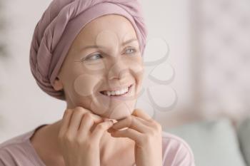 Happy woman after chemotherapy at home�