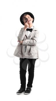 Cute little detective with magnifying glass on white background�