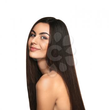 Portrait of beautiful young woman with healthy long hair on white background�