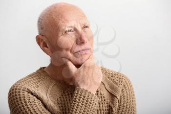 Portrait of senior man on white background�