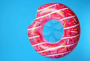 Inflatable ring on color background�