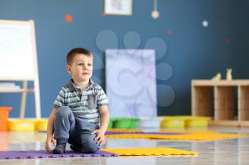 Little boy with autistic disorder in playroom�