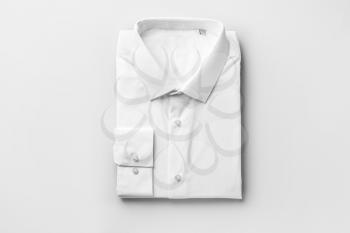 Shirt after dry-cleaning on light background�