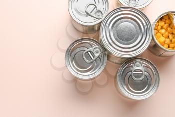 Tin cans with food on light background�