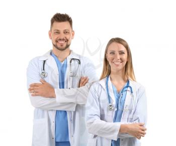 Male and female doctors on white background�