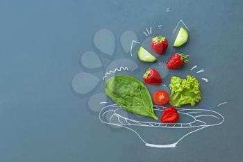 Creative composition with fresh products on grey background�