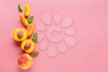 Ripe peaches on color background�