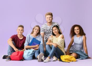 Group of students on color background�