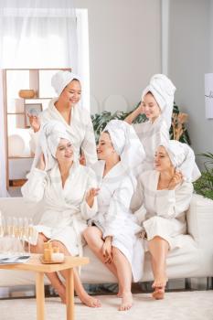 Happy young women during hen party at home�
