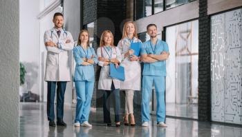 Team of doctors in hall of clinic�