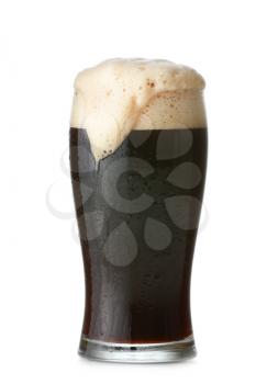 Glass of fresh beer on white background�