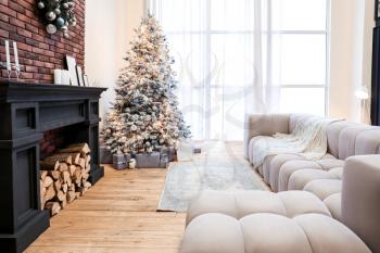 Interior of living room decorated for Christmas celebration�
