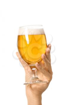 Hand with glass of beer on white background�
