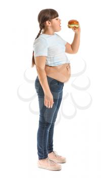 Overweight girl with unhealthy burger on white background�