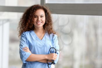 Young African-American nurse in clinic�