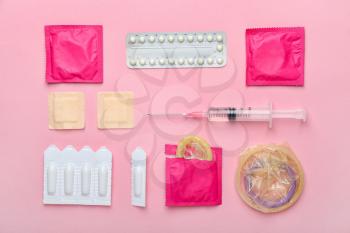 Different contraceptives on color background�